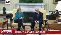 Trump, Merkel’in elini sıkmadı