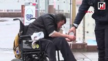 Bedensel engelli vatandaş, polis memurunun yardımıyla abdest aldı