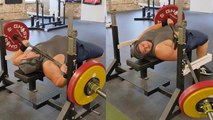 Man's neck HORRIFICALLY gets stuck under heavy barbell during workout