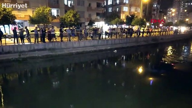 Kanala uçan otomobili görmek için sıraya girenler, koronavirüs tedbirlerini hiçe saydı