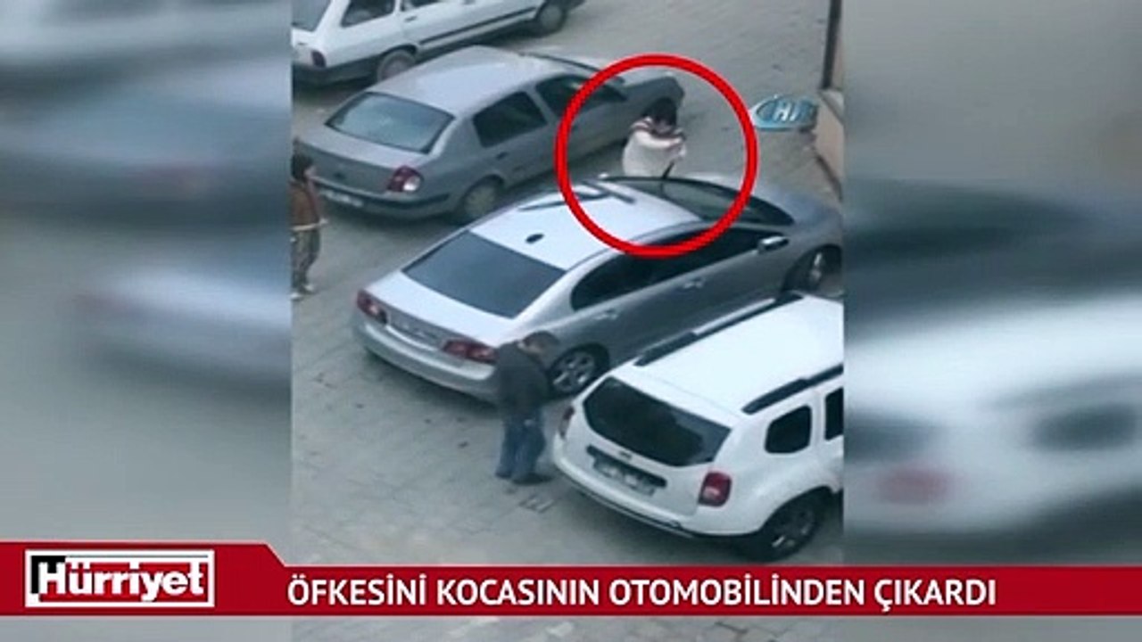 Eşiyle tartışan kadın, öfkesini kocasının otomobilinden çıkardı