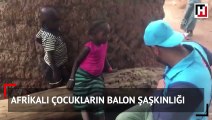 Afrikalı çocukların balon şaşkınlığı