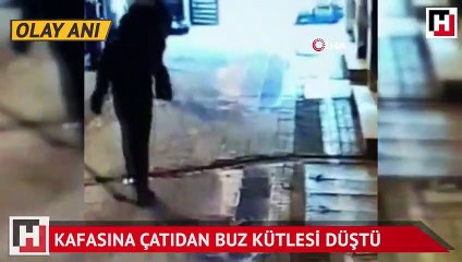 Kafasına çatıdan buz kütlesi düştü!