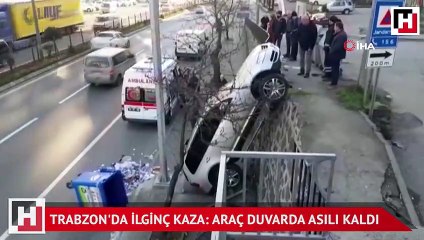 Trabzon'da ilginç kaza: Araç duvarda asılı kaldı