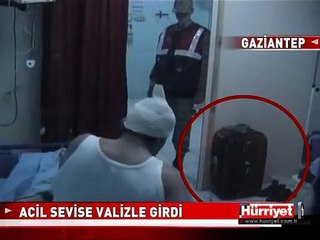 KAZADA YARALANDI ALTIN DOLU VALİZİ YANINDAN AYIRMADI