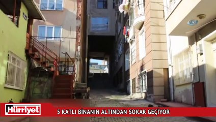 5 katlı binanın altından sokak geçiyor