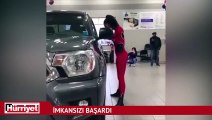 Elinde tepsiyle arabanın altından geçti