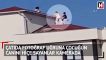 Küçük kızı fotoğraf çekmek için çatıya çıkaran sorumsuzlar kamerada