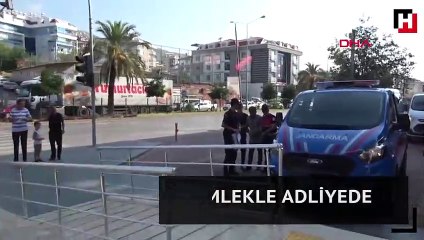 Eş katili, kanlı gömlekle adliyede