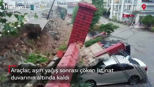 Araçlar, aşırı yağış sonrası çöken istinat duvarının altında kaldı