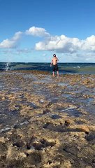Big Wave Plows Over Man on Beach