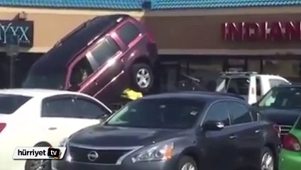 Otomobilini çekiciden kurtarmaya çalışan sürücü