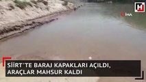 Siirt'te baraj kapakları açıldı, araçlar mahsur kaldı