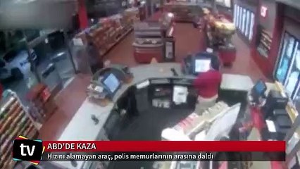 Önce polislerin arasına sonra mağazaya daldı