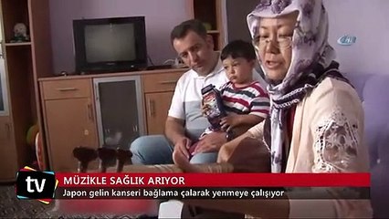 Japon gelin kanseri bağlama çalarak yenmeye çalışıyor