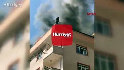 Çatıdan, aşağıda açılan battaniyeye böyle atladı