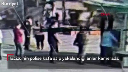 Tacizcinin polise kafa atıp yakalandığı anlar kamerada