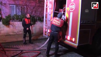 Evinin yanışını gözyaşlarıyla izledi