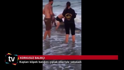 Balıkçının köpek balığıyla olan mücadelesi yürek hoplattı