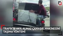 Otomobilin bagajında çamaşır makinesiyle akıl almaz yolculuk kamerada