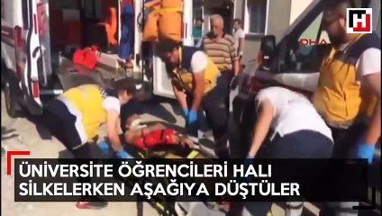 Üniversite öğrencileri halı silkelerken aşağıya düştüler