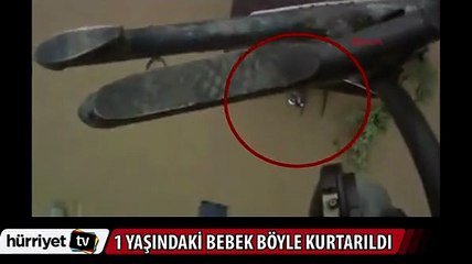 Selde mahsur kalan 1 yaşındaki bebek böyle kurtarıldı