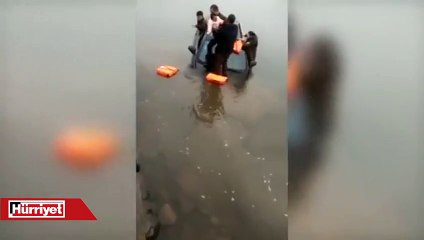 Çin'de bir bebek batan otomobilden fırlatılarak kurtarıldı