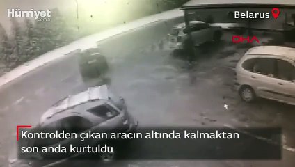 Belarus'ta kontrolden çıkan aracın altında kalmaktan son anda kurtuldu