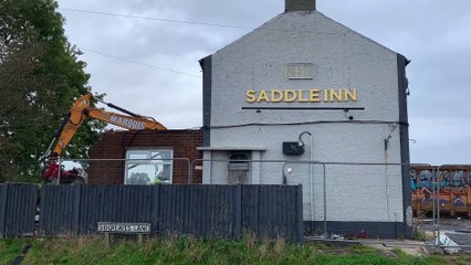 The Saddle pub being demolished