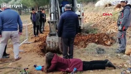 BİYOM merkezindeki çalışmayı durdurmak için kepçenin önüne yattı