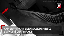 Kamerayı fark eden şaşkın hırsız, bisikleti geri bıraktı