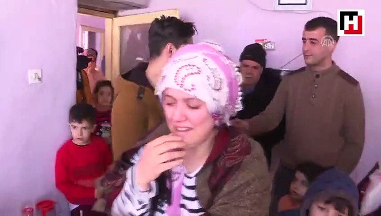 Kendisini kurtaran Suriyeliye sımsıkı sarıldı