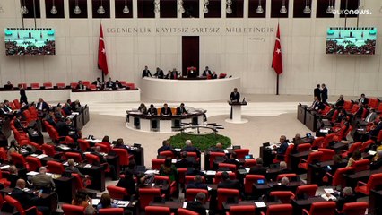 Turkish MP smashes phone with hammer in furious speech over social media law