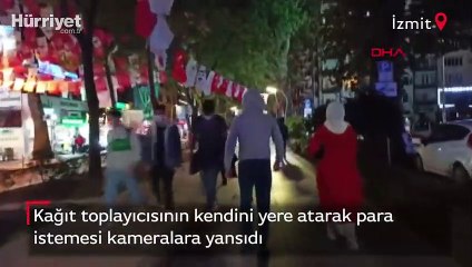 Kağıt toplayıcısının kendini yere atarak para istemesi kameralara yansıdı