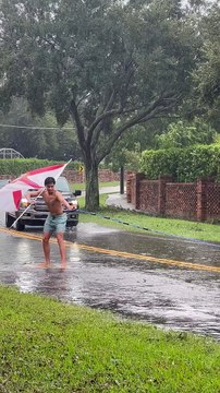 Surfing in the Street After Hurricane Ian