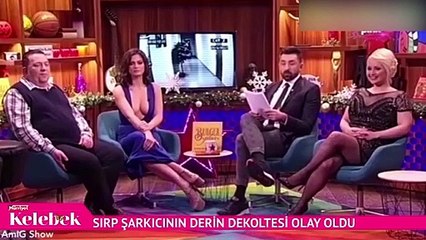 Sırp şarkıcının derin dekoltesi canlı yayına damgasını vurdu