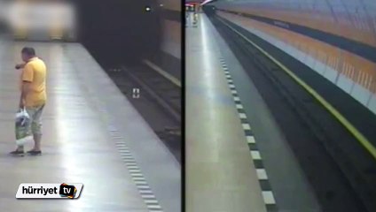 Uyardığı adam tarafından raylara itildi