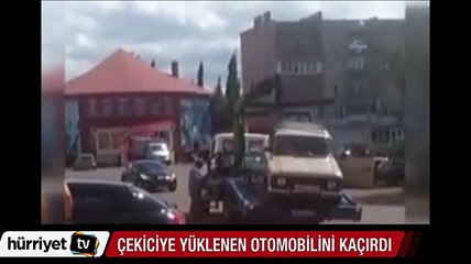 Otomobilini çekiciden böyle kaçırdı