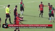 Yerde yatan futbolcuyu sürükleyerek saha dışına çıkardılar