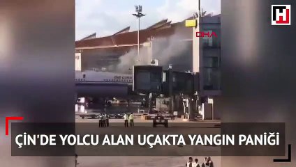 Çin'de yolcu alan uçakta yangın paniği