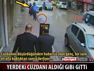 DİLENCİ KADININ KAMERAYA YAKALANDI