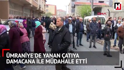Ümraniye'de yanan çatıya damacana ile müdahale etti