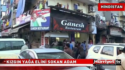 ELİNİ 200 DERECELİK KIZGIN YAĞIN İÇİNE DALDIRDI