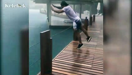 Nusret Gökçe yağmurun tadını böyle çıkardı