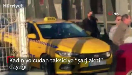 Kadın yolcudan taksiciye “şarj aleti” dayağı