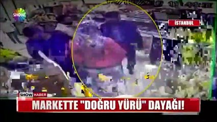 Markette 'Doğru yürü' dayağı