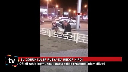 Öfkeli rahip boynundaki haçla sokak ortasında adam dövdü