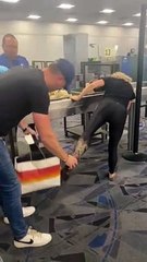 Girl Struggles with New Cowboy Boots at TSA