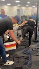 Girl Struggles with New Cowboy Boots at TSA