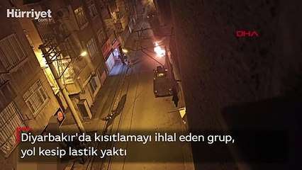 Diyarbakır'da kısıtlamayı ihlal eden grup, yol kesip lastik yaktı